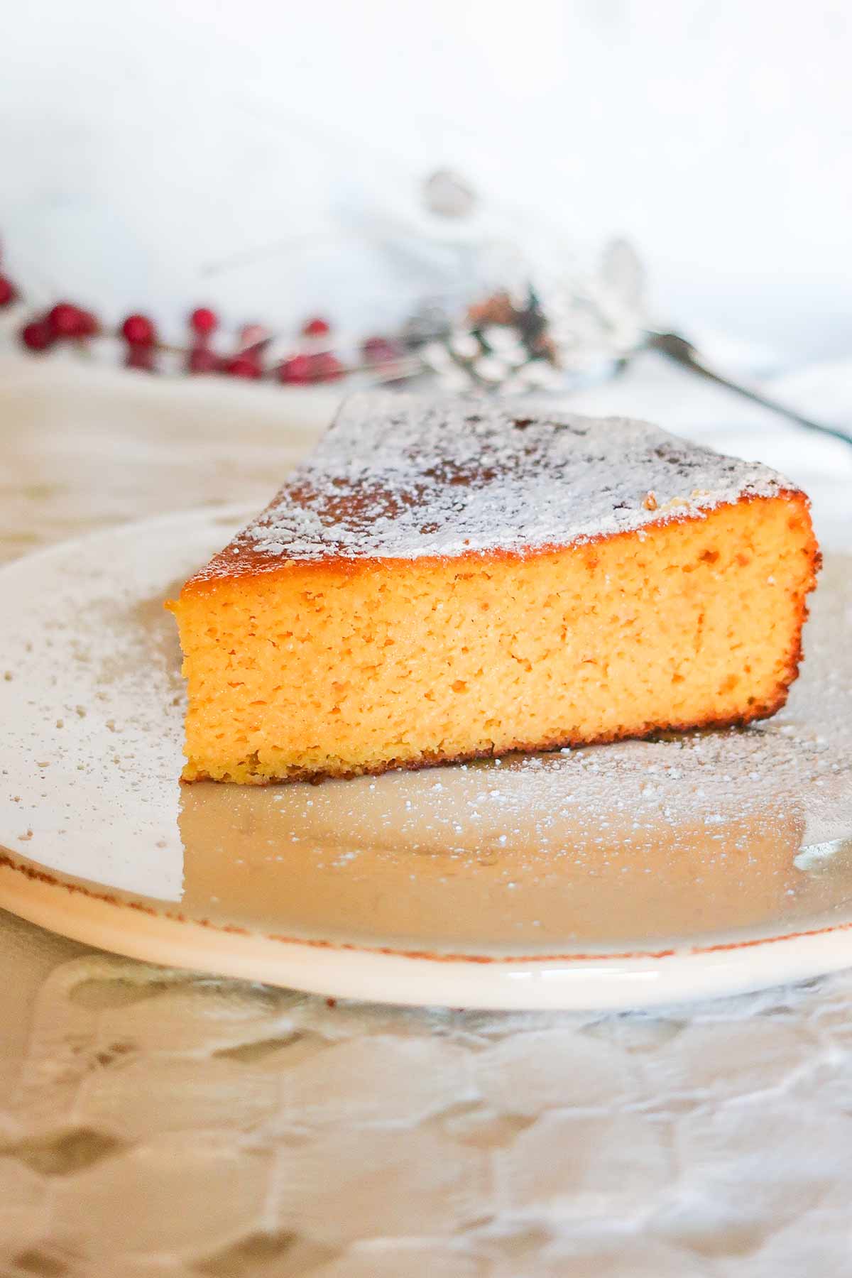 side view of a slice of mandarin cake