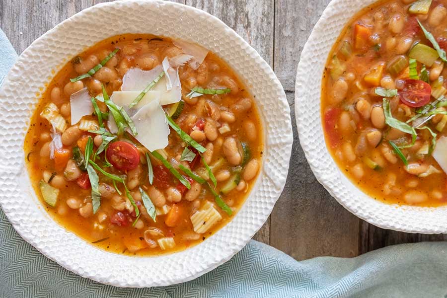 minestrone soup in two bowls