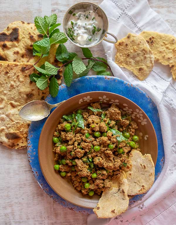 lamb keema curry with chapati, in a bowl, gluten free