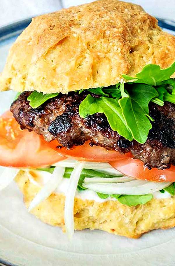 hamburger with tomatoes, lettuce in a gluten-free bun