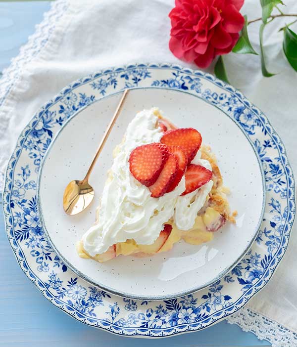slice of gluten free strawberry cream pie on a plate