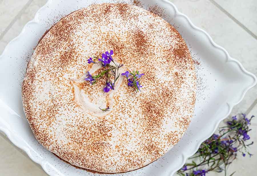 overview of gluten free tiramisu cheesecake on a platter for Easter