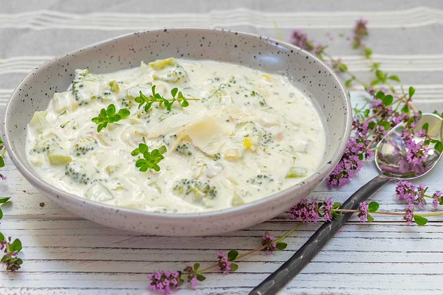 cream of broccoli leek soup with parmesan in a bowl