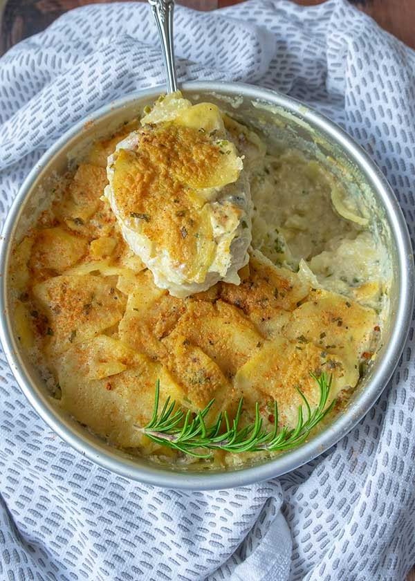 overview of vegan scalloped potatoes in a pan