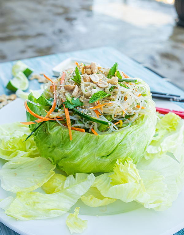 Vietnamese noodle salad in lettuce bowl.