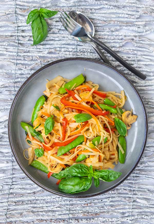gluten-free saucy Thai noodles with veggies on a plate