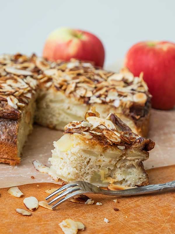 gluten-free apple sponge cake with one slice cut out