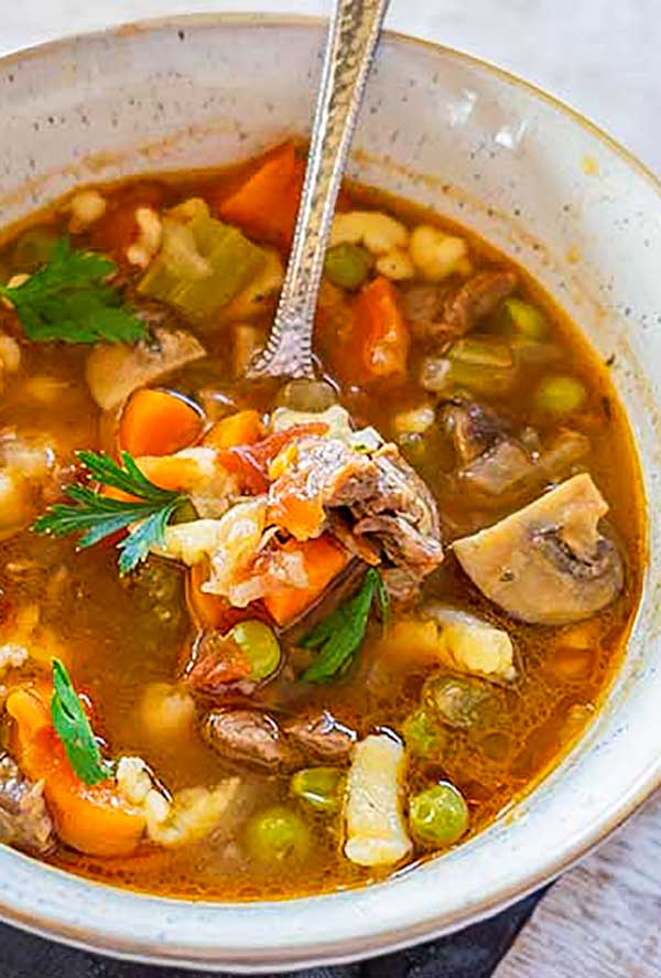 instant pot beef and vegetable soup in a bowl