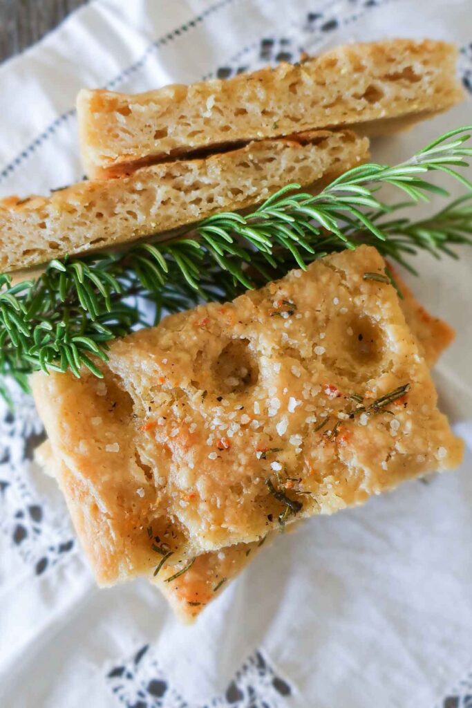 slices of gluten free foaccia topped with fresh rosemary