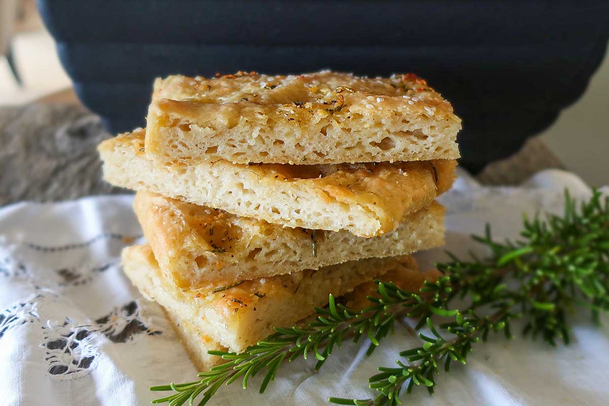 stacked focaccia pieces made with rosemary and garlic