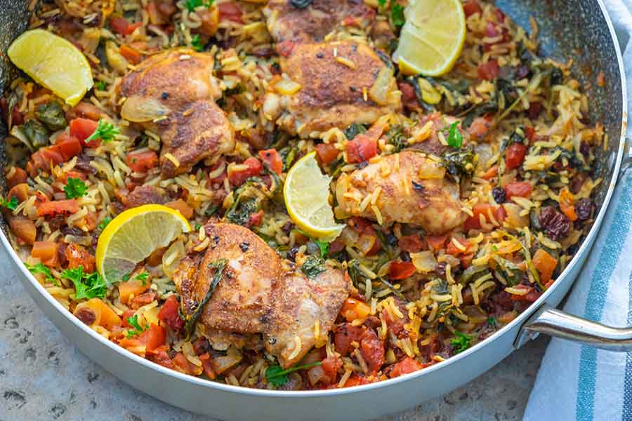 moroccan chicken rice dish in a skillet