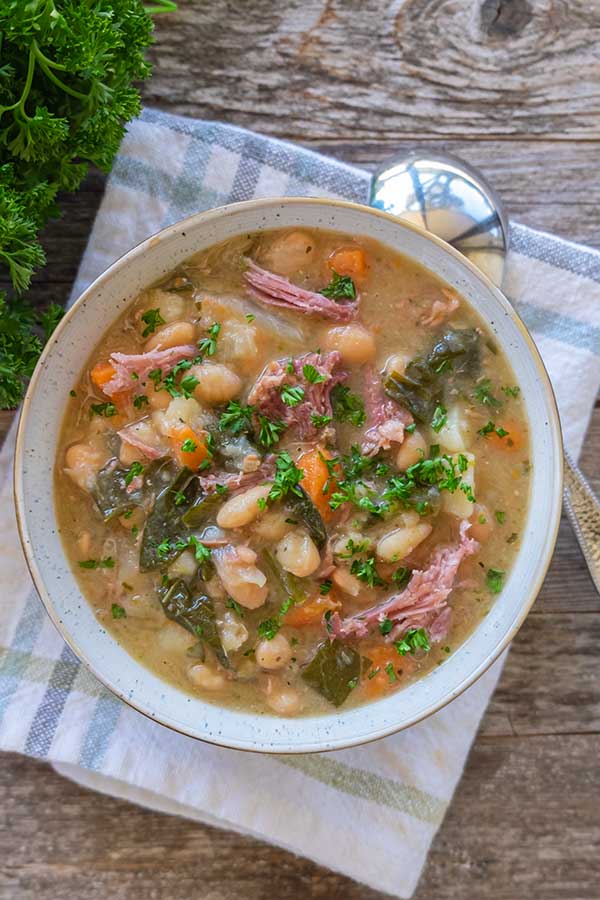 white bean soup with hap in a bowl