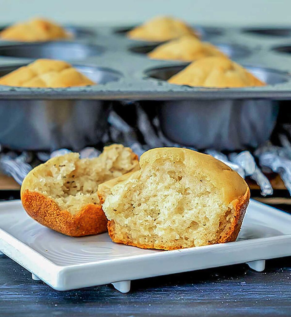 butter roll cut in half on a plate