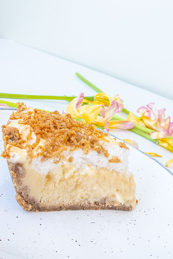 a slice of custard flapper pie on a plate