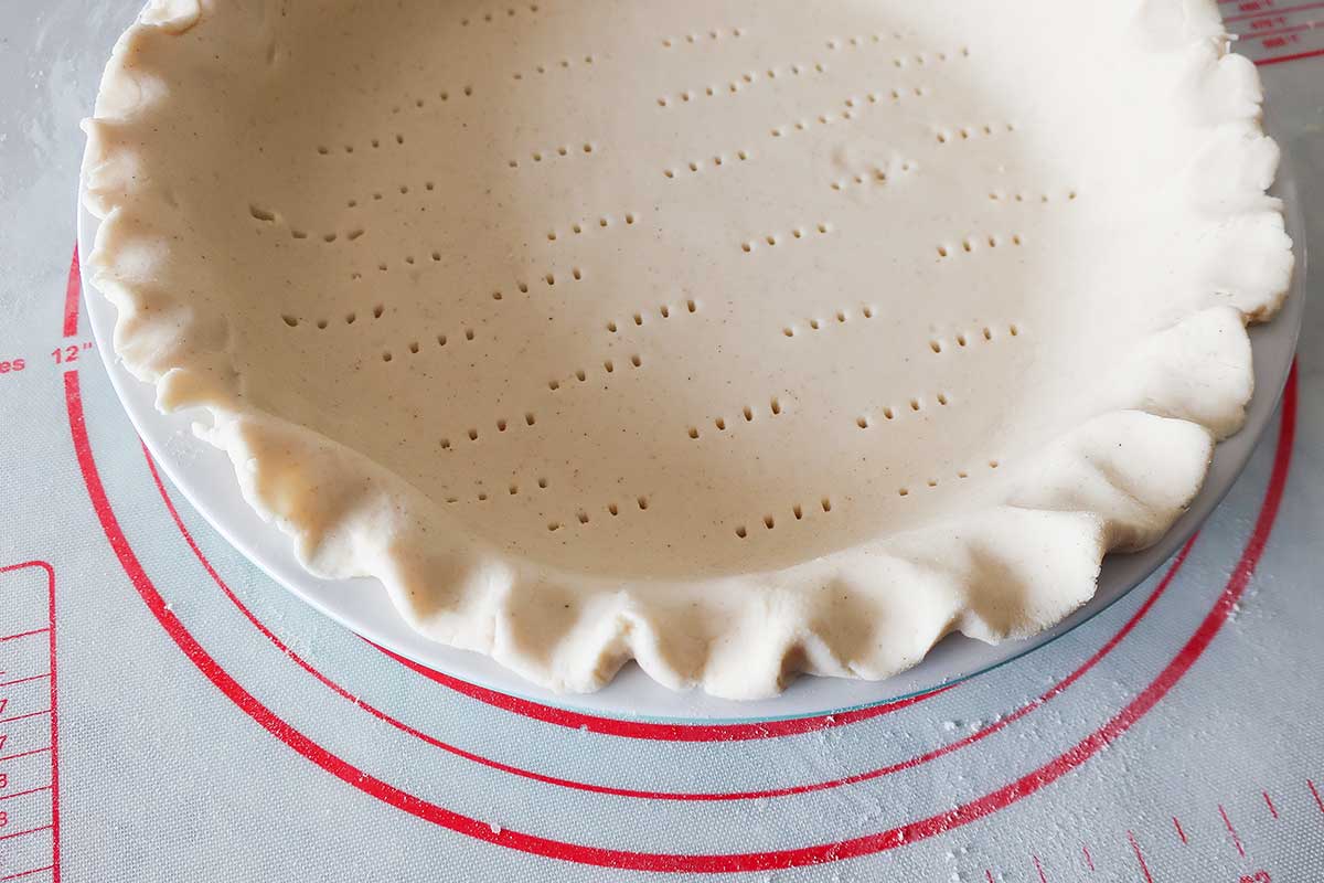 4 ingredient unbaked pie crust dough in a pie dish