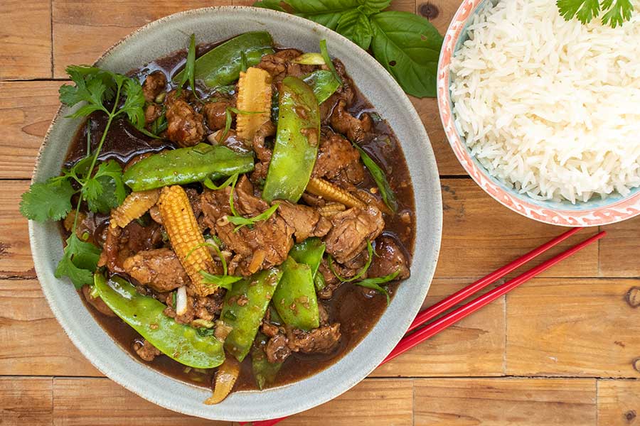 honey garlic pork tenderloin in a bowl takeout style