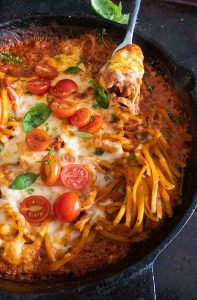 gluten-free pasta bake in cast iron skillet