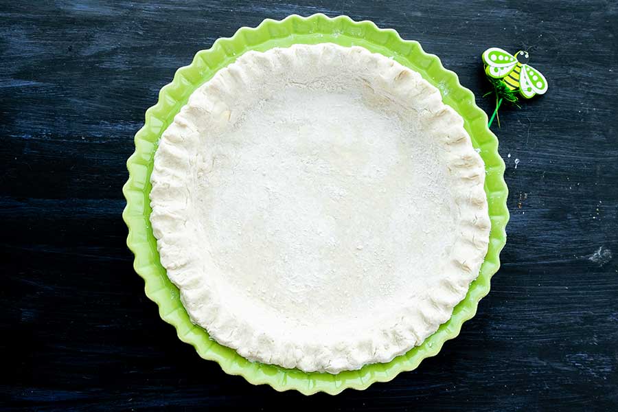 unbaked gluten-free pie crust in a pie dish