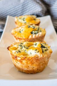 gluten free puff pastry spinach cheese cups on a platter