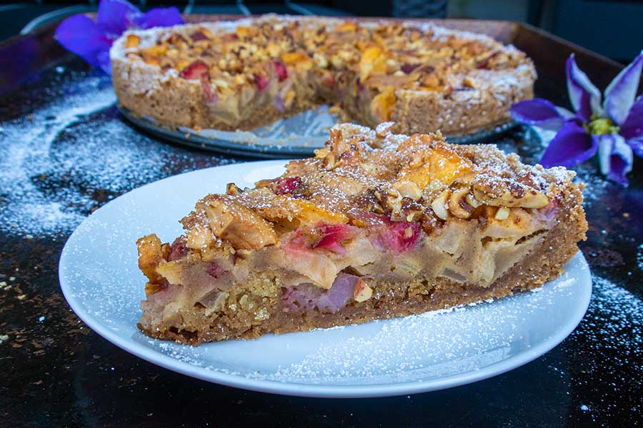 a slice gluten free strawberry apple cake on a dessert plate