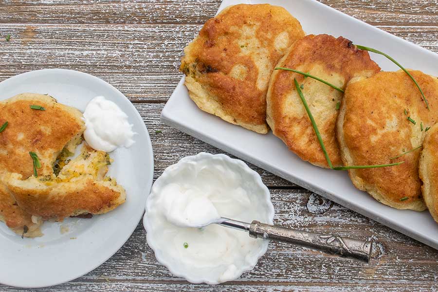 gluten free stuffed potato cakes on a plate