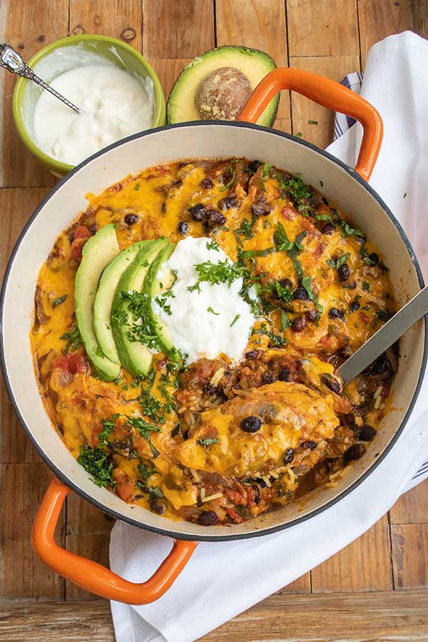 salsa verde chicken rice in a casserole dish