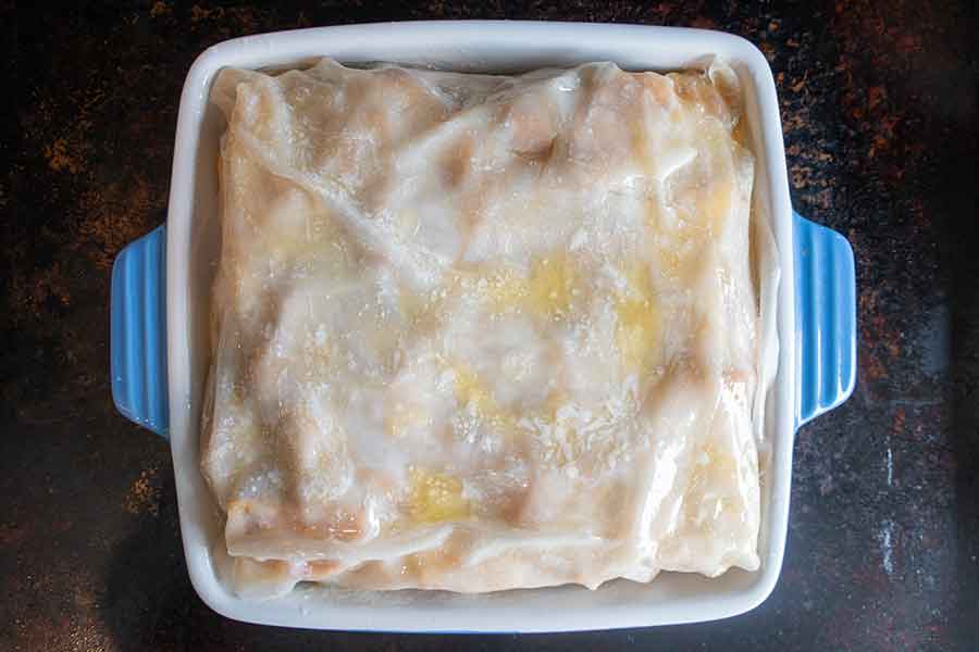 apple strudel in a baking pan before baking