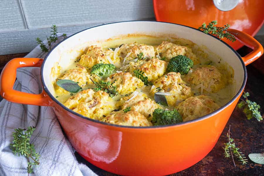 broccoli cheddar soup with dumplings in a pot