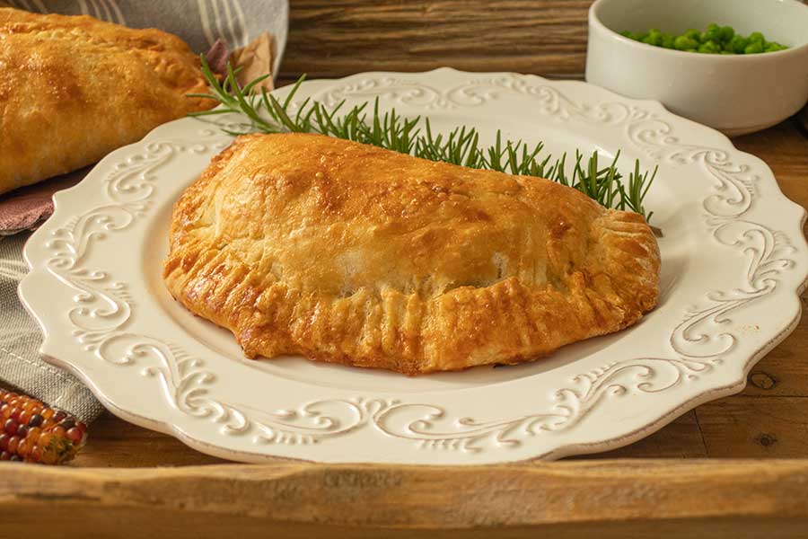 baked gluten free Cornish pasty on a plate