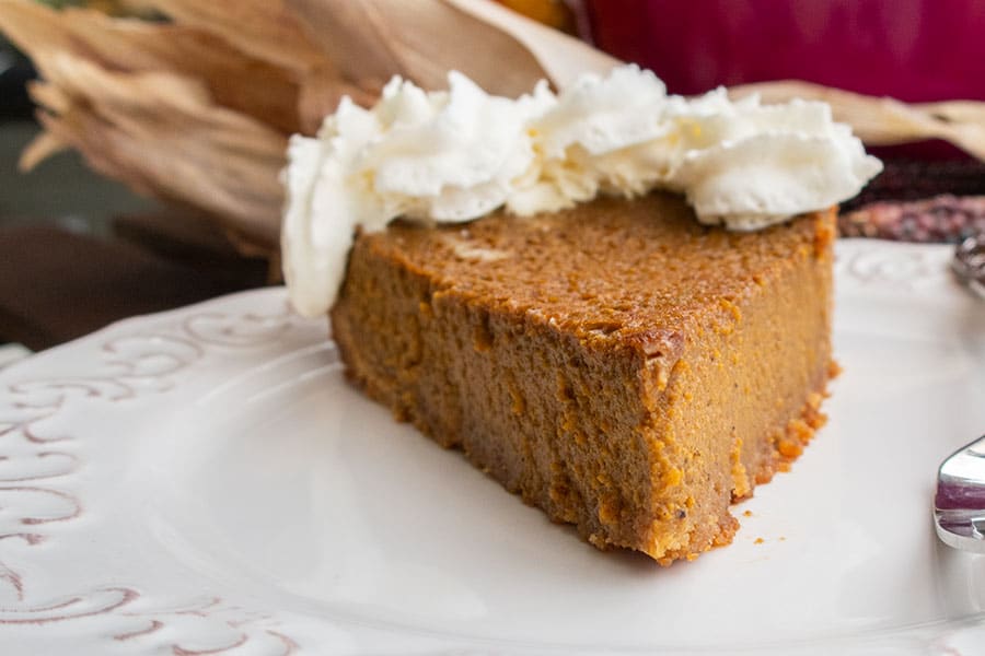 slice of grain-free pumpkin pie on a plate