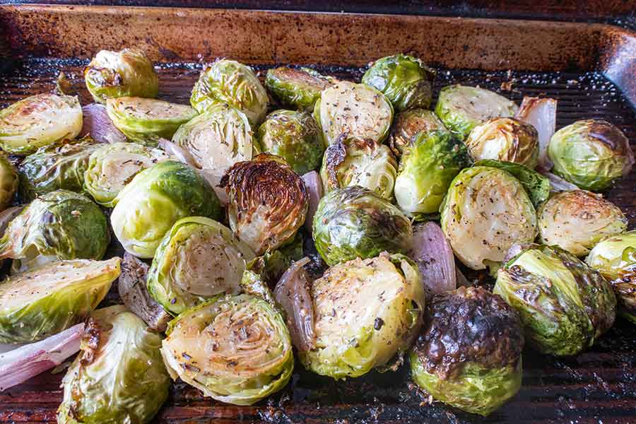 roasted brussel sprouts on a baking tray