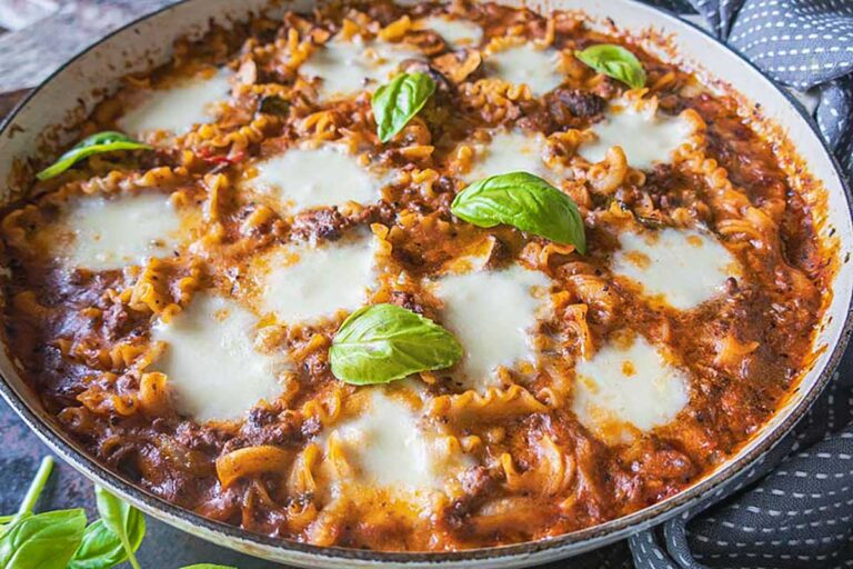 gluten free stove top lasagna in a creamy sauce and topped with melted cheese
