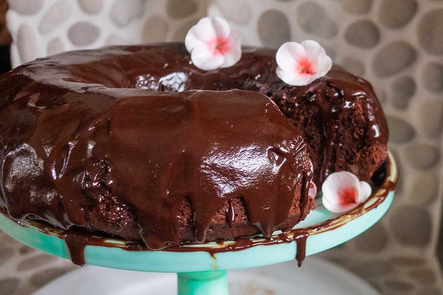 chocolate brownie cake on a cake platter