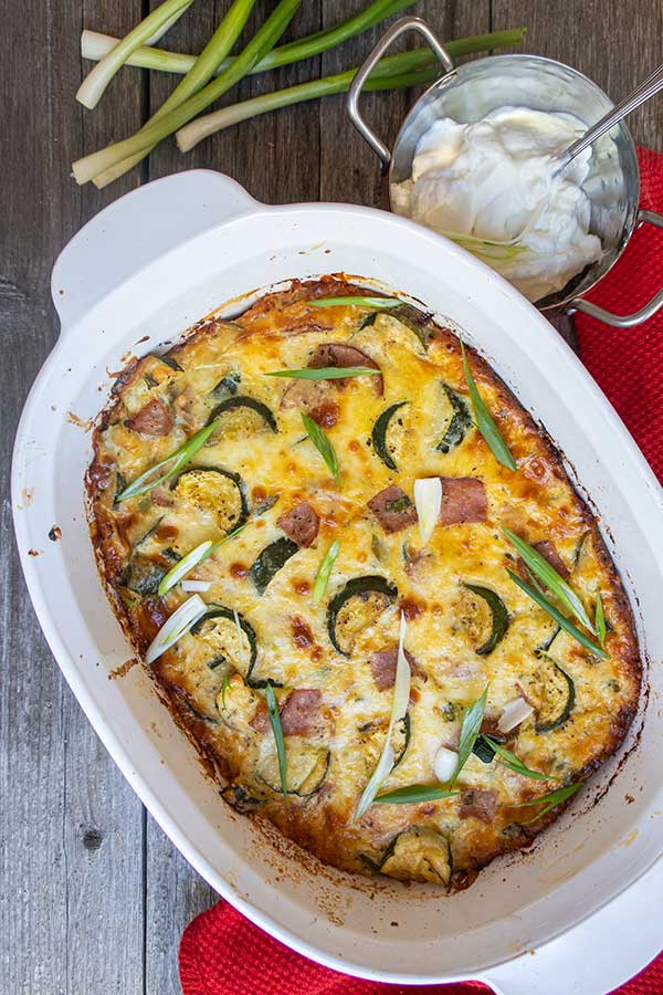 zucchini and ham cheese casserole in a dish