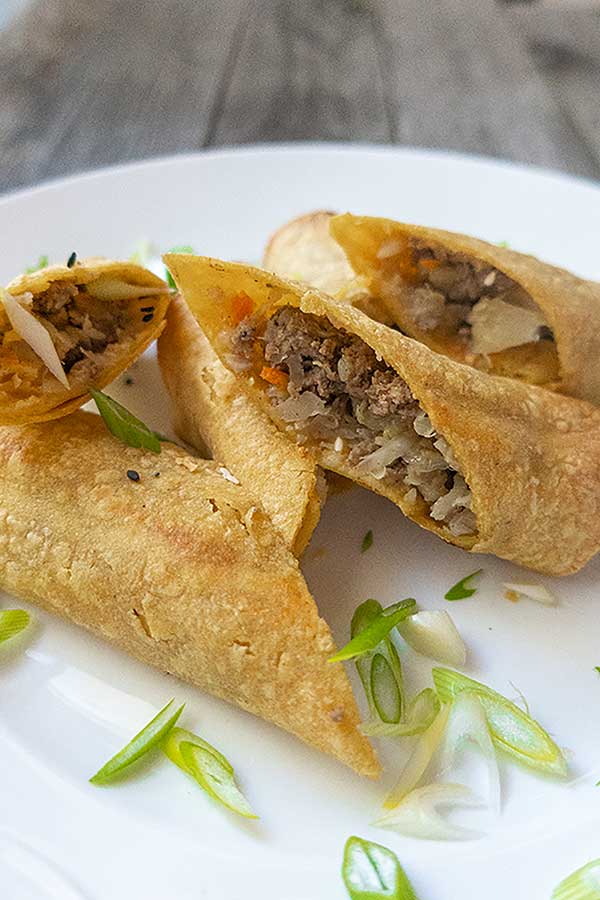 halved egg rolls on a small platte