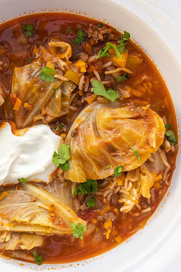 cabbage roll soup topped with sour cream, gluten free