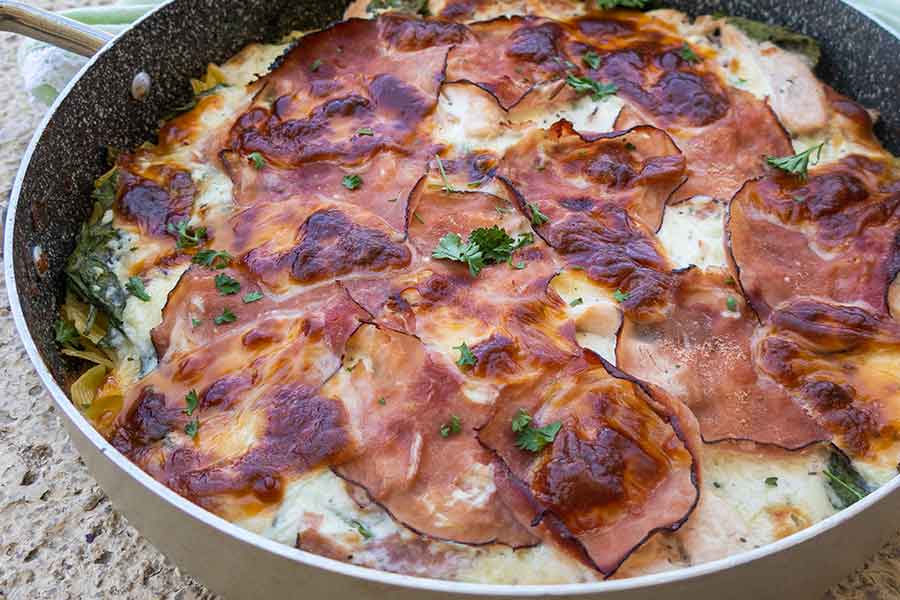 chicken cordon bleu pasta in a skillet