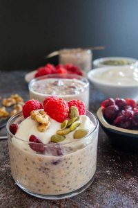 cranberry walnut overnight breakfast oats in glass jars