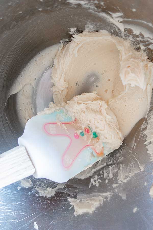 mixing vanilla cream in a bowl