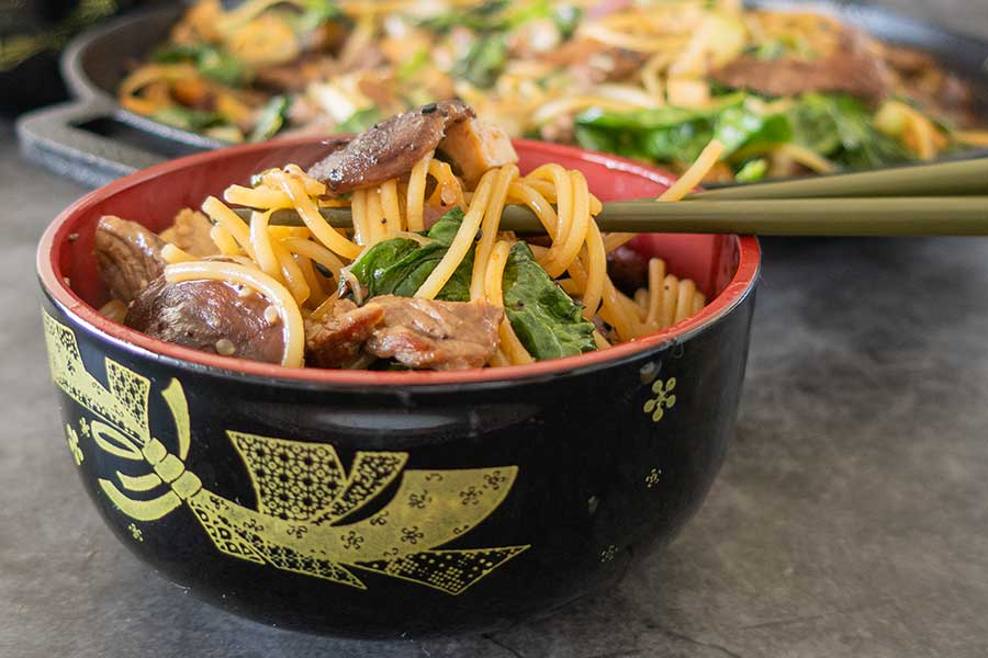 sukiyaki noodle salad in a bowl with chopsticks