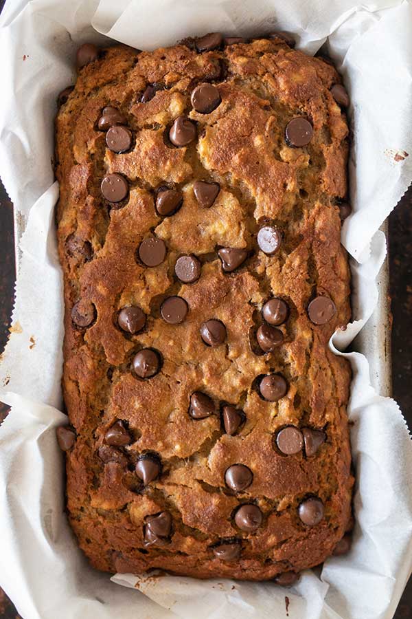 baked coconut flour banana bread with chocolate chips in a loaf pan