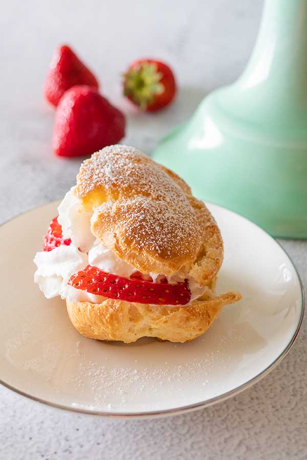 gluten-free cream puff with strawberry on a plate