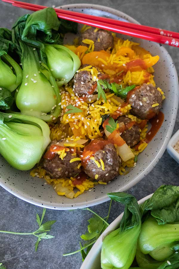 firecracker rice bowl with sesame meatballs