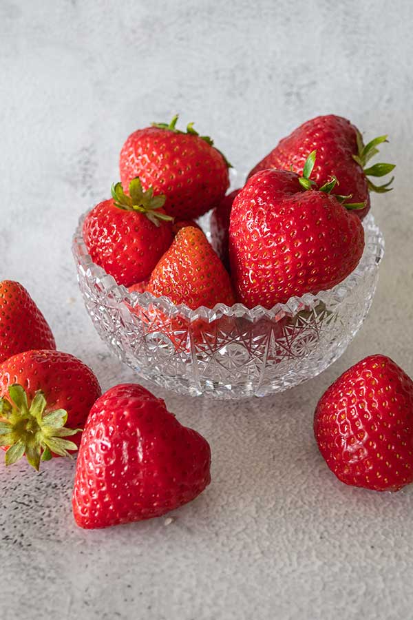 fresh strawberries in a crystal bowl