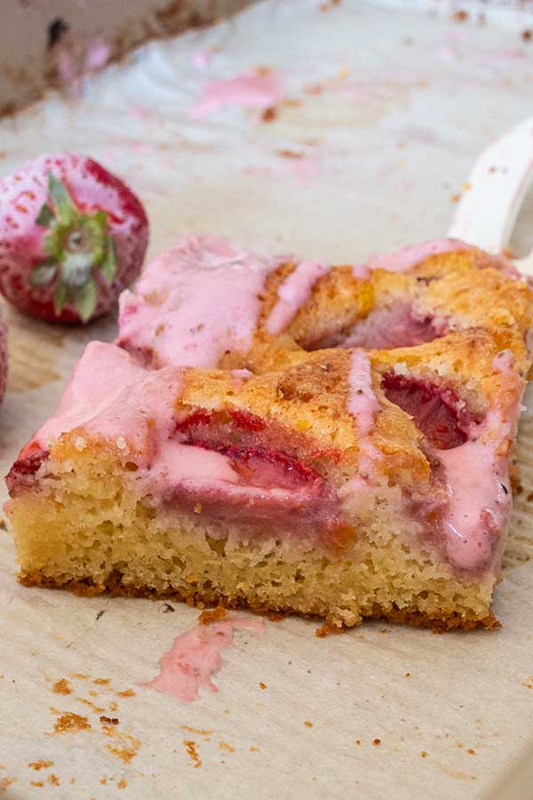 a slice of strawberry sheet cake, gluten-free