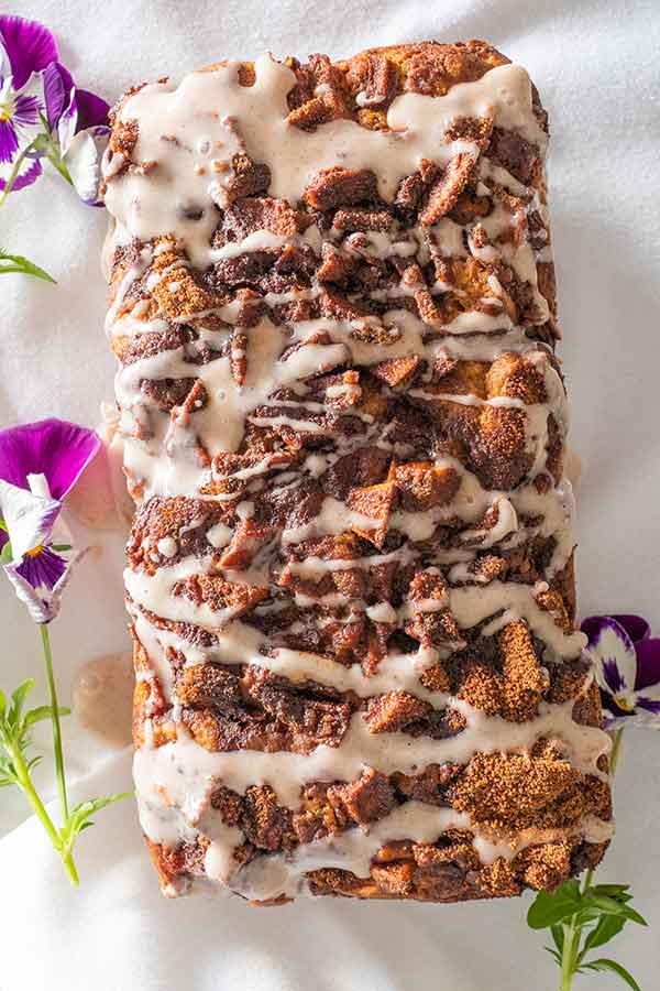 cinnamon glaze over baked apple bread, gluten-free