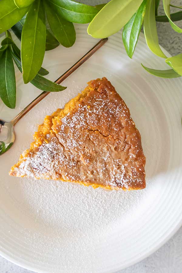overview of a slice of gluten-free Jamaican sweet potato pie on a plate