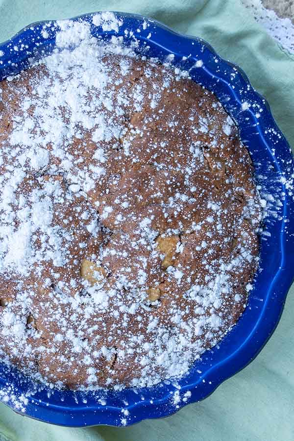 gluten free french apple cake dusted with powdered sugar