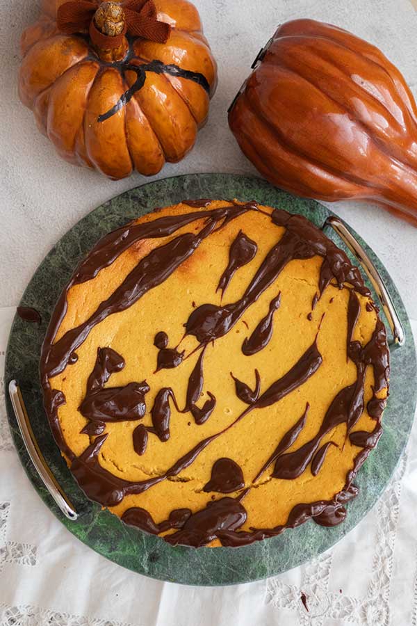 overview of pumpkin mousse cake drizzled with chocolate ganache