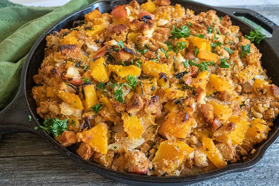 Holiday apple butternut squash stuffing in a skillet